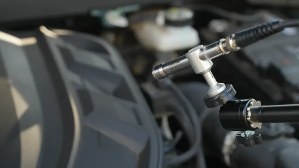 CRY3213 NVH microphone installed in vehicle engine bay for powertrain noise measurement