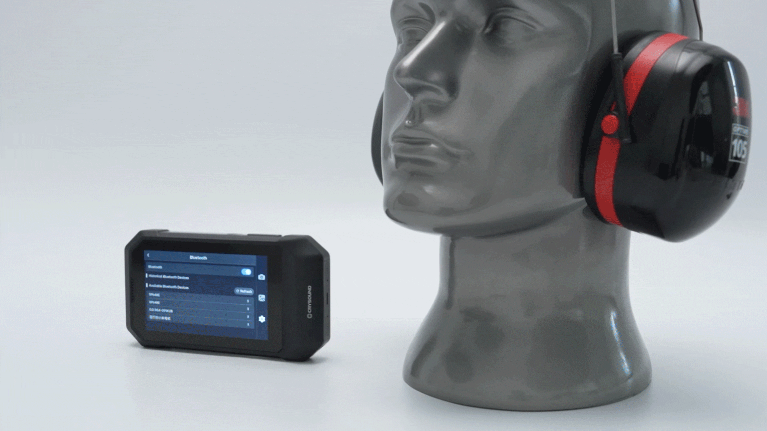 Acoustic imaging camera paired with Bluetooth earmuffs for real-time sound monitoring and inspection
